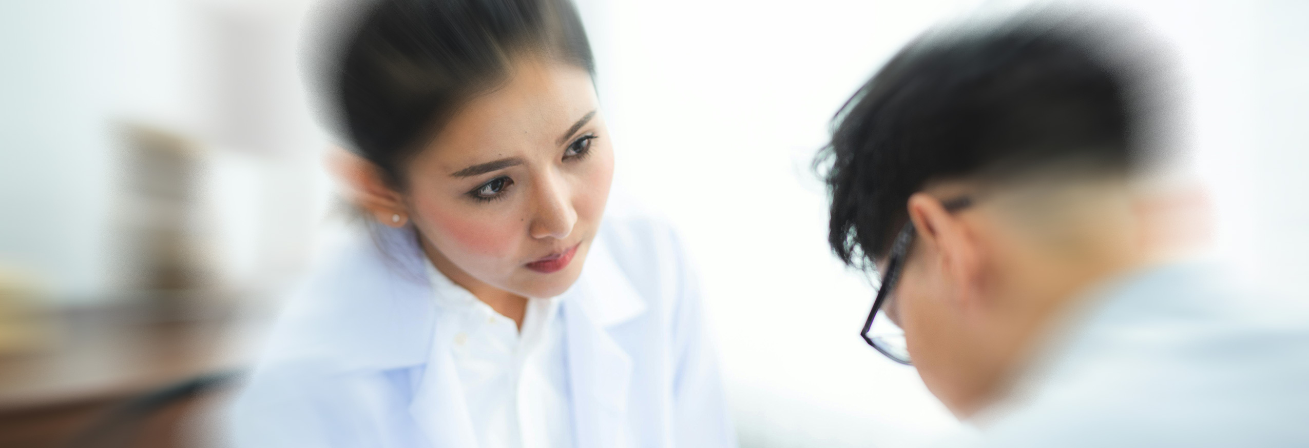 A doctor talking to a patient's family